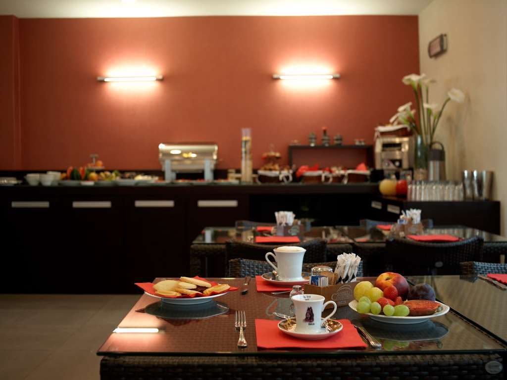 Hotel Montini Linate Airport بيستياره بوروميو المطعم الصورة